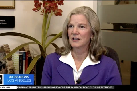 Dr. Elmore sitting in her office for an interview