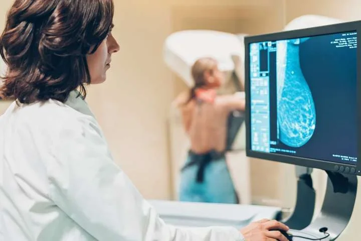 A doctor looking at a mammography