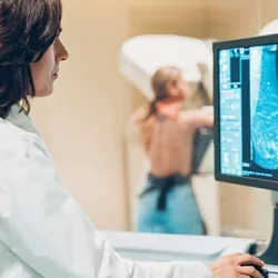 A doctor looking at a mammography